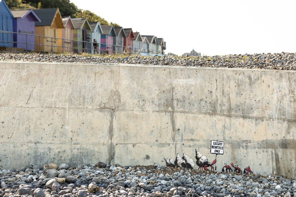 Graffity of Banksy on a seaside